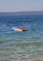 Грудастая мамка умело работает с писюном в комнате 20 фотография